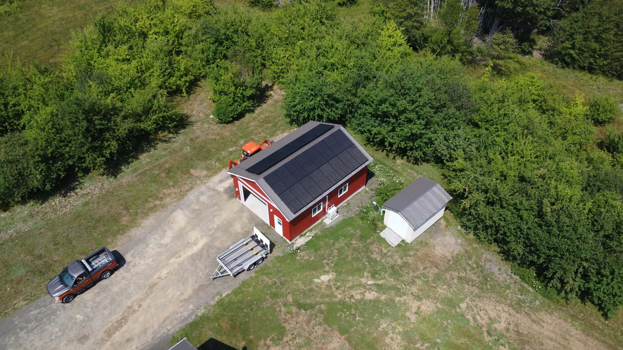 Aerial view of a completed residential solar installation in Acaciaville, Nova Scotia