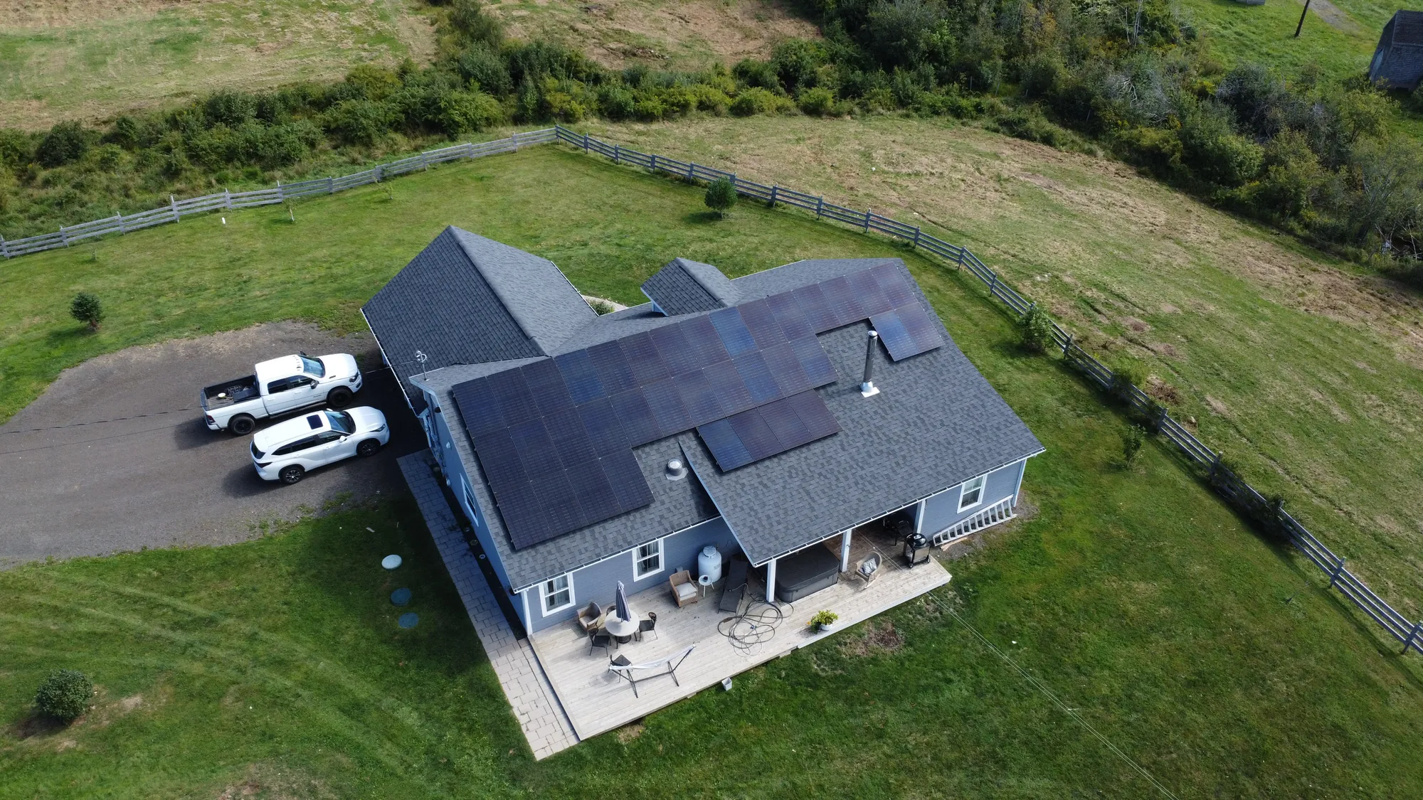 Aerial view of a home in Culloden, Nova Scotia with an 18 kW rooftop solar array