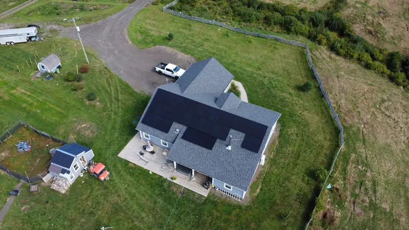 Side aerial of the Culloden home and its rooftop solar array