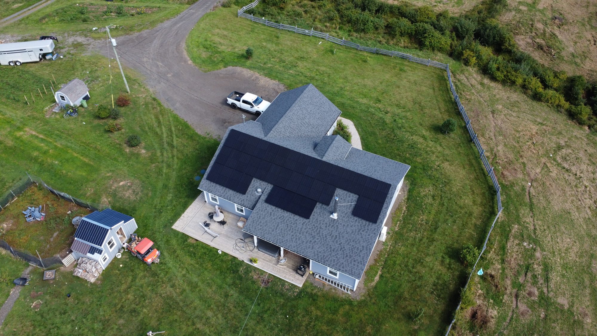 Side aerial of the Culloden home and its rooftop solar array