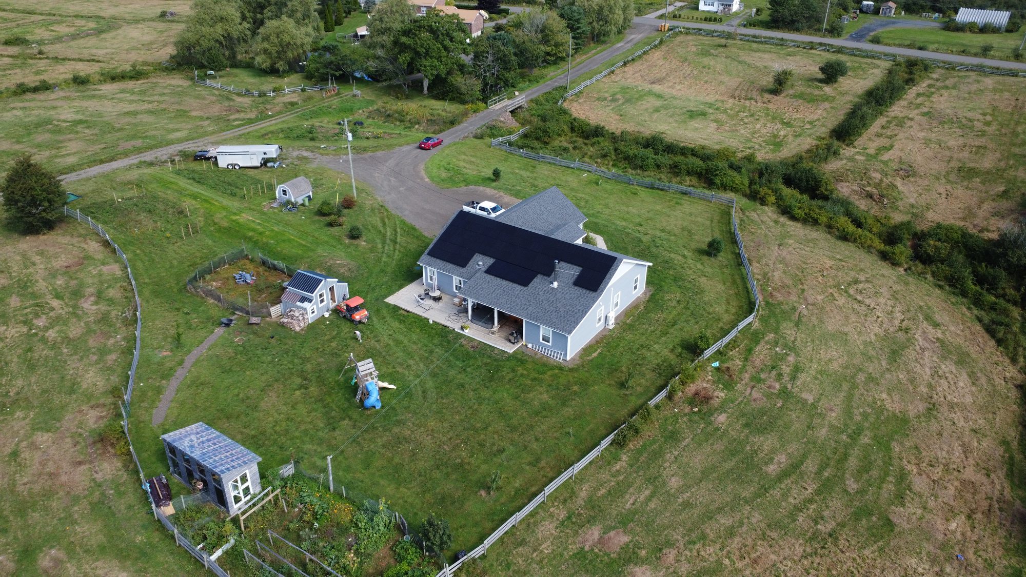 Wide aerial of the Culloden property, outbuildings and fields
