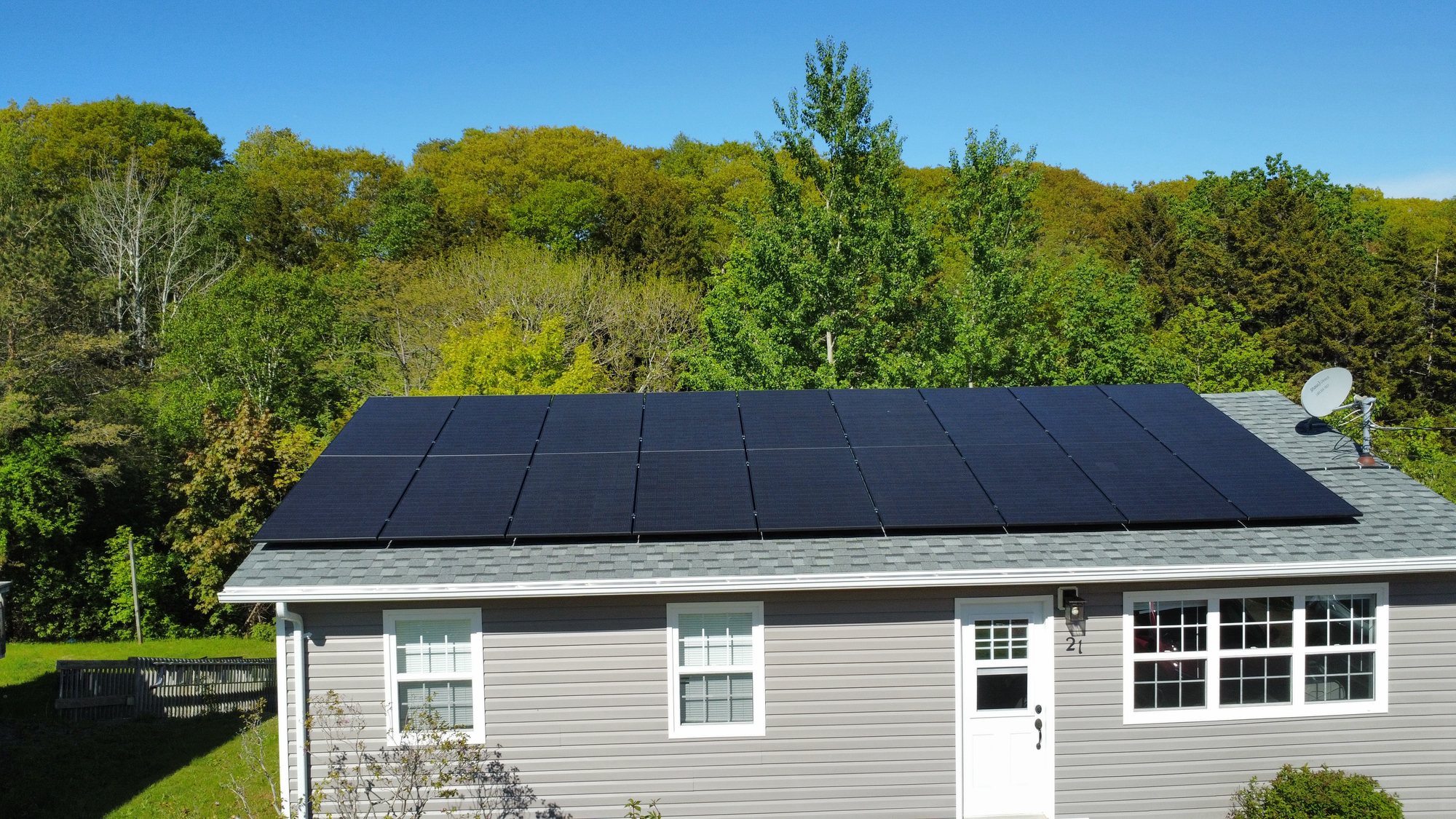 Single-storey home in Digby, Nova Scotia with an 11 kW solar array across the full roof