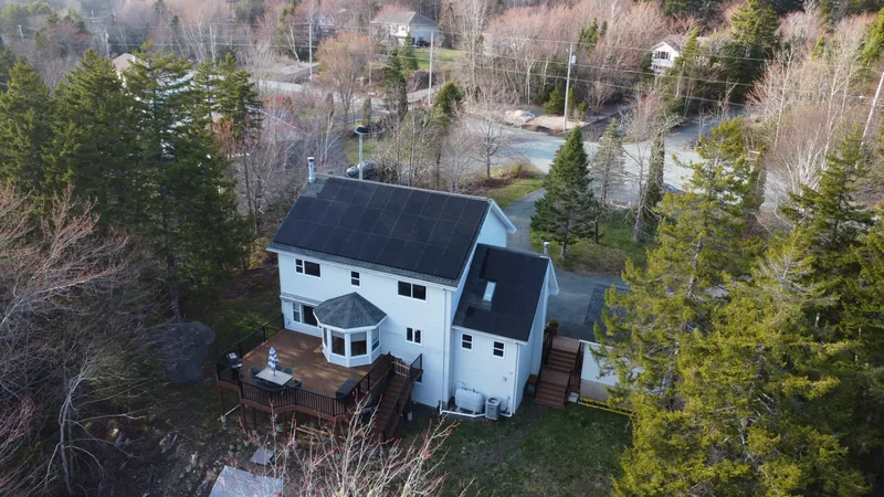 Front elevation of the Hammonds Plains home with the rooftop solar array visible