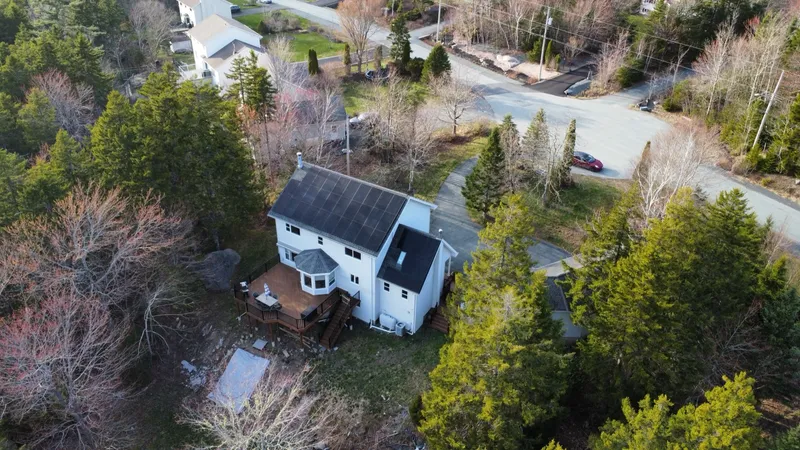 Wide aerial of the Hammonds Plains property and surrounding woodland