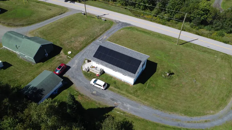 Side aerial of the Marshalltown home and its south-facing array