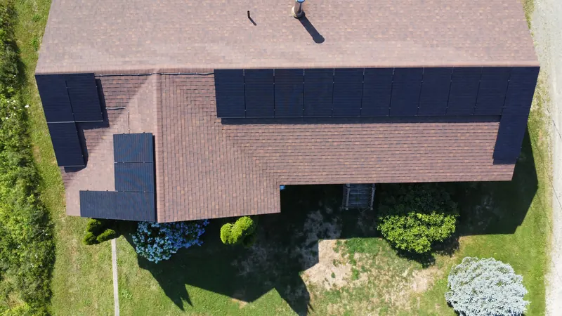 Overhead view of the Saint Alphonse array on the main roof and the south-facing wing