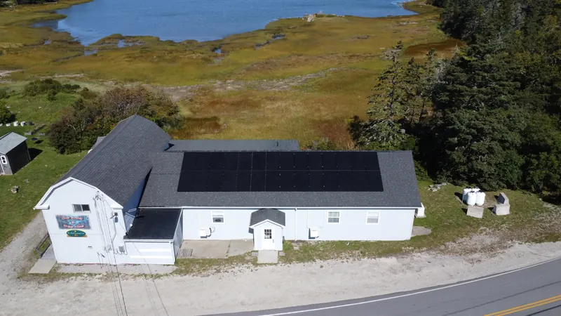 Front aerial of the Surettes Island hall from the road
